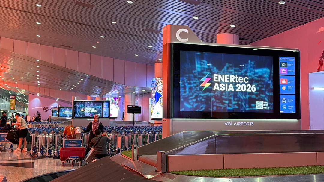 Airport digital screen advertising in a Malaysian airport terminal