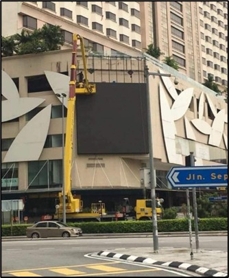 Outdoor building-mounted LED billboard installation